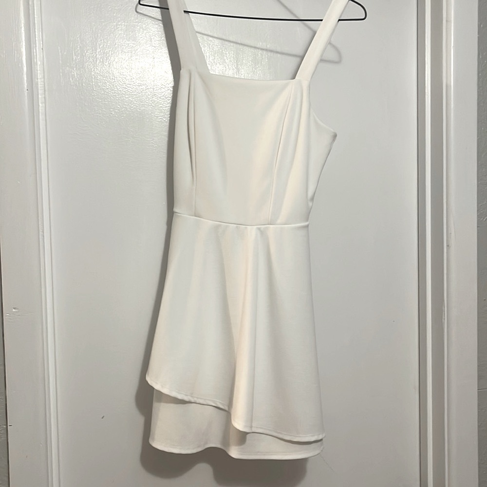 Has slight makeup stain on neckline, but cannot be seen while wearing